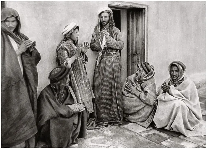 Framed Print : A mullah teaching a prayer to a young man, Iraq, 1925. Artist: A Kerim