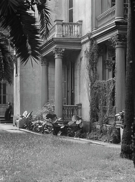 Multi-story house, possibly in the Garden District, New Orleans, between 1920 and 1926. Creator: Arnold Genthe