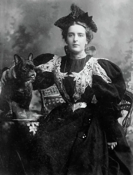 Framed Print : Natalie Barney seated with dog, 1910. Creator: Bain News Service Framed Print : Natalie Barney seated with dog, 1910. Creator: Bain News Service