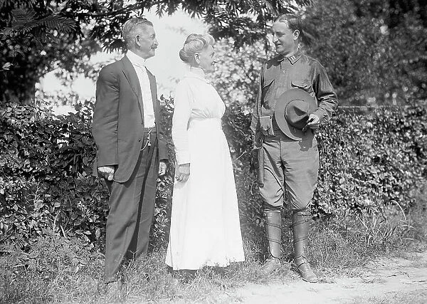 National Guard of D.C. - Capt. Louis Wilson And Parents, 1915. Creator: Harris & Ewing. National Guard of D.C. - Capt. Louis Wilson And Parents, 1915. Creator: Harris & Ewing