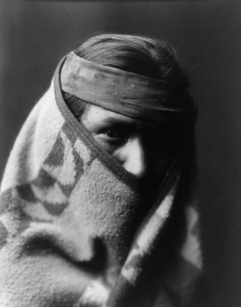 A Navaho [with blanket wrapped around head and shoulders], c1904. Creator: Edward Sheriff Curtis