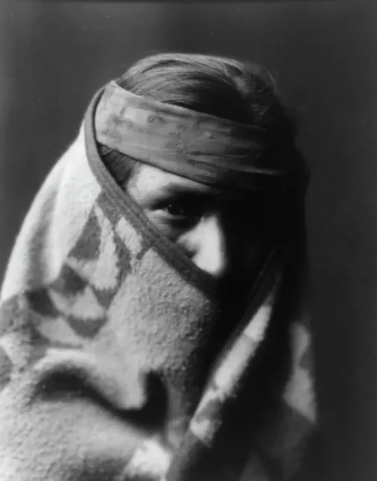 Framed Print : A Navaho [with blanket wrapped around head and shoulders], c1904. Creator: Edward Sheriff Curtis