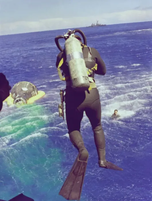 Framed Print : Navy diver leaps from helicopter, 1965. Creator: NASA Framed Print : Navy diver leaps from helicopter, 1965. Creator: NASA