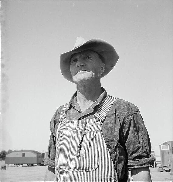 Nebraska farmer come to pick peas, near Calipatria, California, 1939. Creator: Dorothea Lange