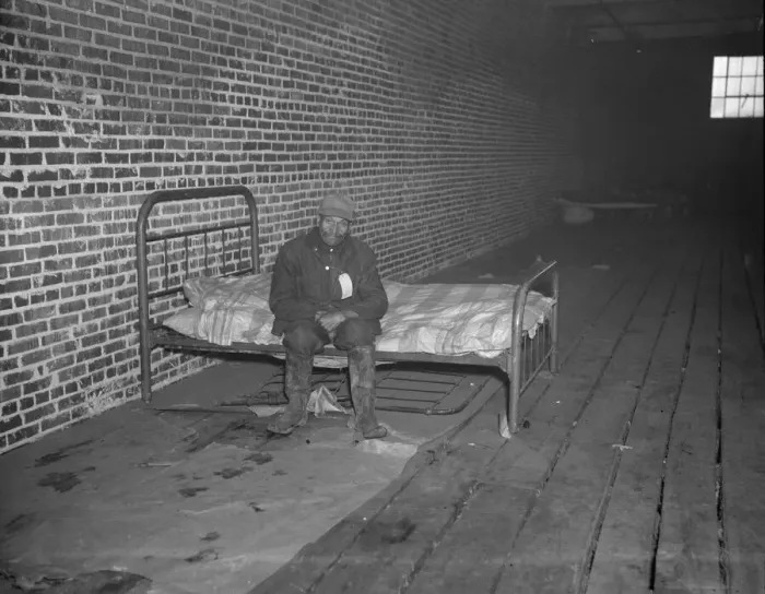 Framed Print : Negro flood refugee in the Red Cross temporary infirmary of Forrest City, Arkansas, 1937. Creator: Walker Evans Framed Print : Negro flood refugee in the Red Cross temporary infirmary of Forrest City, Arkansas, 1937. Creator: Walker Evans