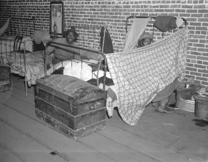 Framed Print : Negro flood refugees in the Red Cross temporary infirmary at Forrest City, Arkansas, 1937. Creator: Walker Evans Framed Print : Negro flood refugees in the Red Cross temporary infirmary at Forrest City, Arkansas, 1937. Creator: Walker Evans
