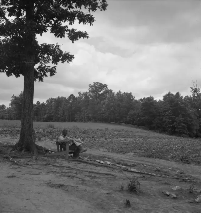 Framed Print : Negro tenant farmer reading paper on a hot Saturday afternoon, Chatham County, North Carolina, 1939. Creator: Dorothea Lange Framed Print : Negro tenant farmer reading paper on a hot Saturday afternoon, Chatham County, North Carolina, 1939. Creator: Dorothea Lange