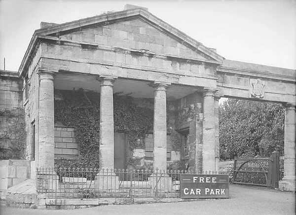 Neoclassical facade with Free Car Park sign, c1935. Creator: Kirk & Sons of Cowes