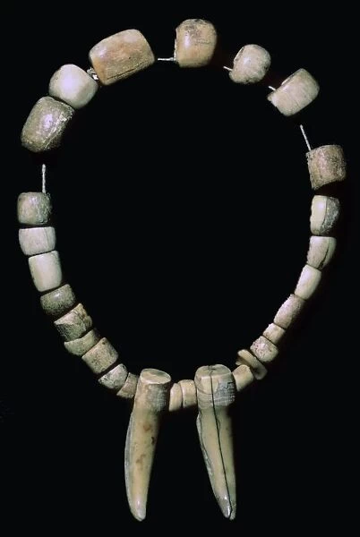 Neolithic necklace of bone and teeth