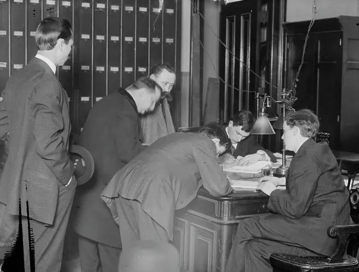 Framed Print : New citizens signing naturalization papers in judge's chambers, 1910. Creator: Bain News Service Framed Print : New citizens signing naturalization papers in judge's chambers, 1910. Creator: Bain News Service