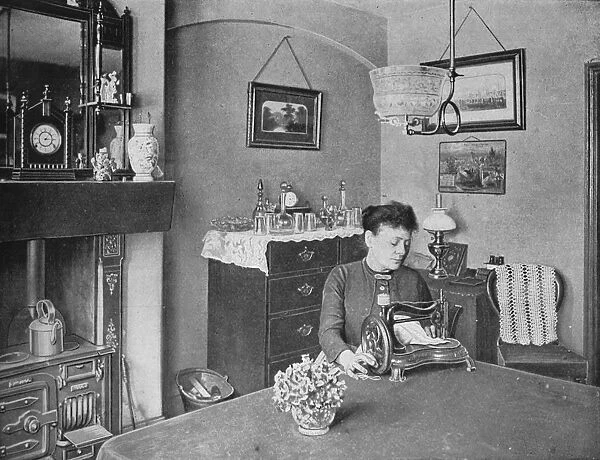 New room in a model dwelling, London, c1900 (1901)