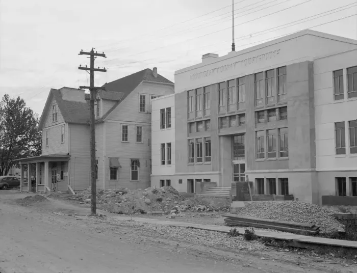Framed Print : The new WPA courthouse alongside the old county courthouse, Bonners Ferry, Idaho, 1939. Creator: Dorothea Lange Framed Print : The new WPA courthouse alongside the old county courthouse, Bonners Ferry, Idaho, 1939. Creator: Dorothea Lange
