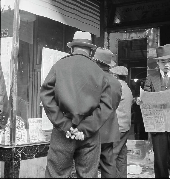 News of the surrender of Canton, San Francisco, California, 1938. Creator: Dorothea Lange