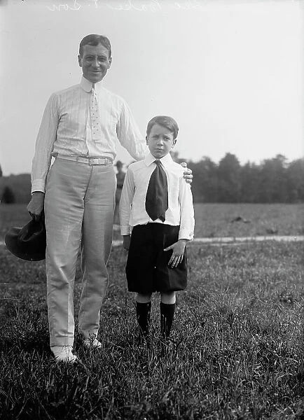 Newton Diehl Baker, Secretary of War, with Son, 1913. Creator: Harris & Ewing. Newton Diehl Baker, Secretary of War, with Son, 1913. Creator: Harris & Ewing