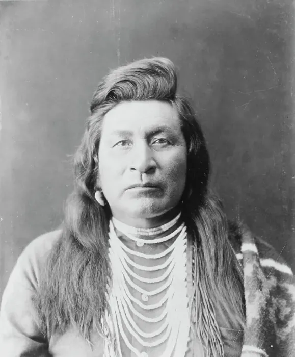 Framed Print : Nez Percé man, head-and-shoulders portrait, facing front, wearing bead necklace... c1899. Creator: Edward Sheriff Curtis Framed Print : Nez Percé man, head-and-shoulders portrait, facing front, wearing bead necklace... c1899. Creator: Edward Sheriff Curtis