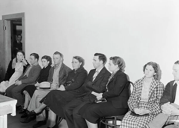 Night meeting in the FSA office, Tulare County, California, 1938. Creator: Dorothea Lange