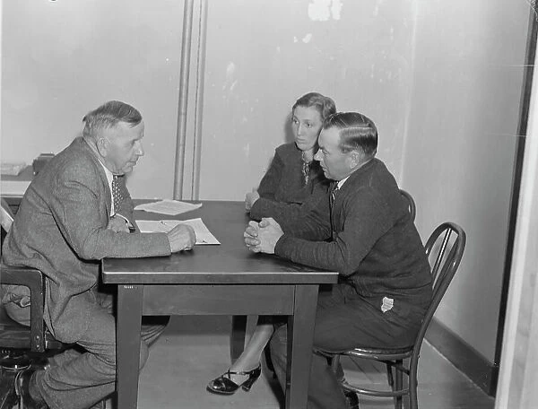 Night meeting in the FSA office, Visalia, Tulare County, California, 1938. Creator: Dorothea Lange