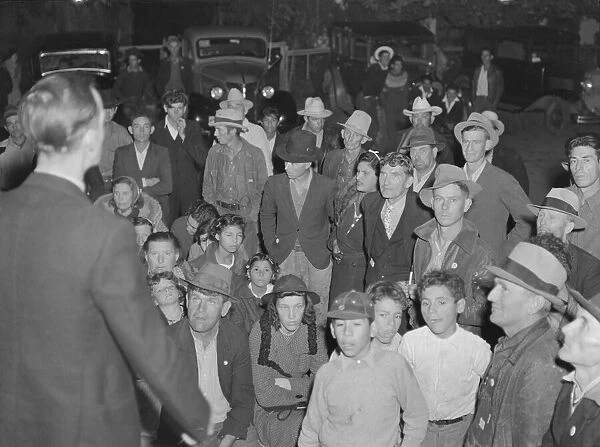 Night street meeting of cotton strikers near end of defeated strike. Kern County, California, 1939. Creator: Dorothea Lange