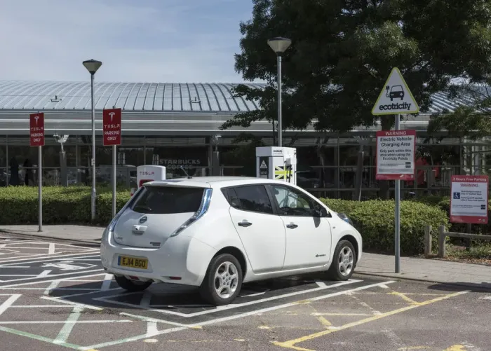 Framed Print : Nissan Leaf at elctric charging point 2015. Creator: Unknown Framed Print : Nissan Leaf at elctric charging point 2015. Creator: Unknown