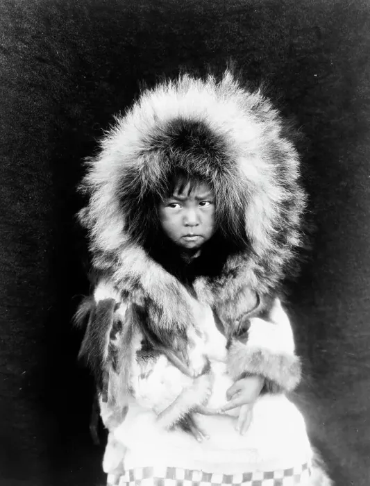 Framed Print : Noatak child, three-quarter length portrait, seated, facing front, c1929. Creator: Edward Sheriff Curtis Framed Print : Noatak child, three-quarter length portrait, seated, facing front, c1929. Creator: Edward Sheriff Curtis