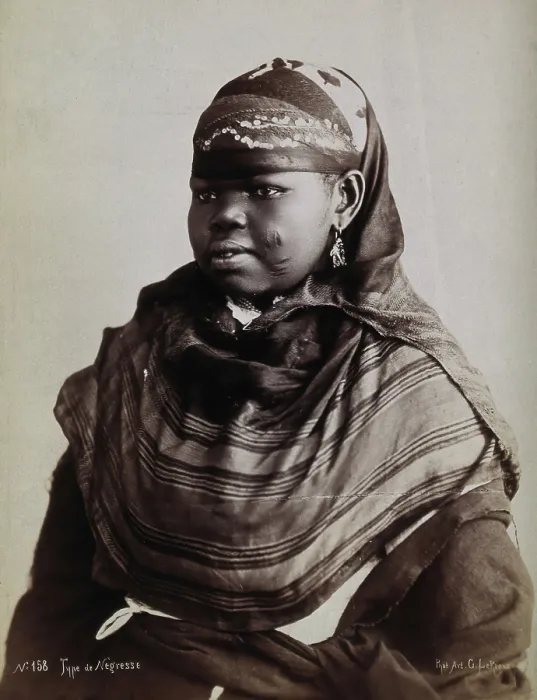 Framed Print : A North African woman with scarification on her cheeks, c1900. Creator: Gabriel Lekegian Framed Print : A North African woman with scarification on her cheeks, c1900. Creator: Gabriel Lekegian