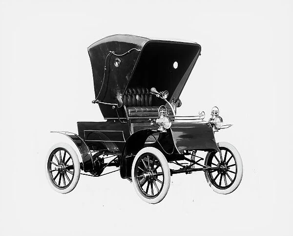 Northern Manufacturing Company automobile, front-quarter view with top, between 1900 and 1910. Creator: William H. Jackson