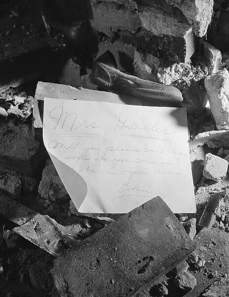 A note left in a wrecked house on Independence Avenue, Washington, D. C, 1942. Creator: Gordon Parks