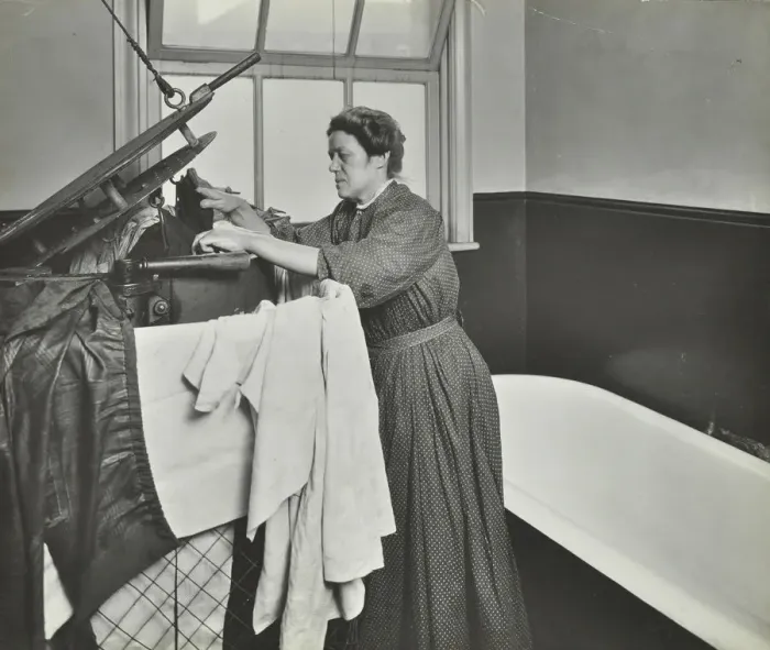 Framed Print : Nurse using a steriliser in the bathroom at Chaucer Cleansing Station, London, 1911 Framed Print : Nurse using a steriliser in the bathroom at Chaucer Cleansing Station, London, 1911