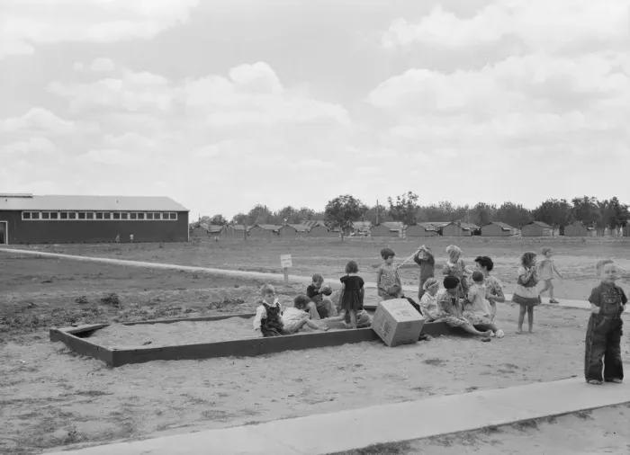 Framed Print : Nursery school children with their teacher, FSA camp, Tulare County, California, 1939. Creator: Dorothea Lange Framed Print : Nursery school children with their teacher, FSA camp, Tulare County, California, 1939. Creator: Dorothea Lange