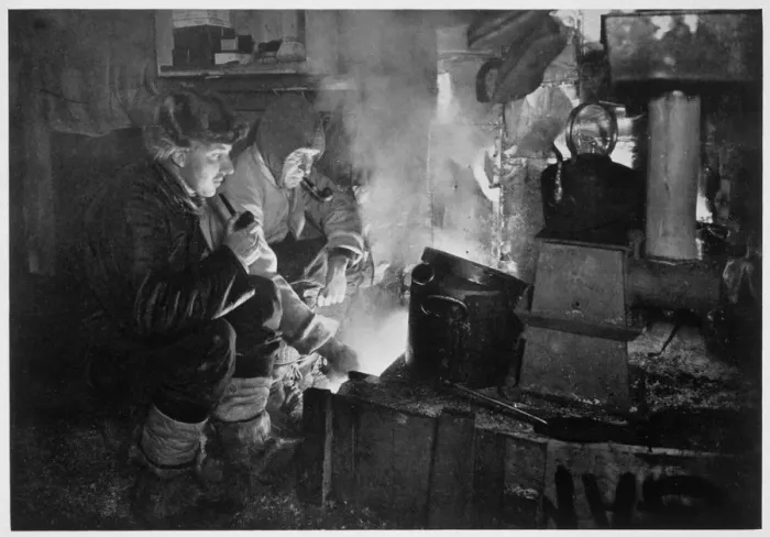 Framed Print : Oates and Meares at the Blubber Stove in the Stables, Antarctica, 1911. Artist Framed Print : Oates and Meares at the Blubber Stove in the Stables, Antarctica, 1911. Artist