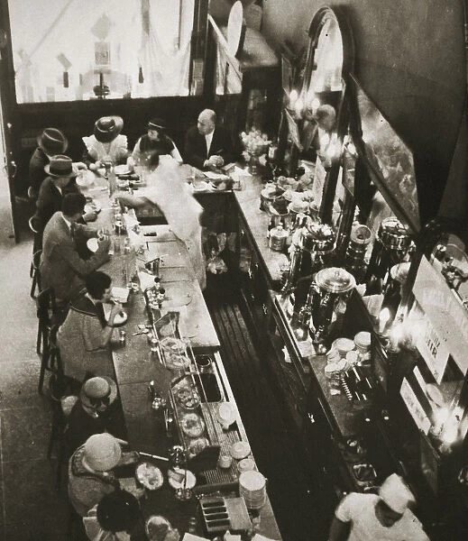 Office workers having lunch at the drug store counter, New York, USA, c1920s-c1930s