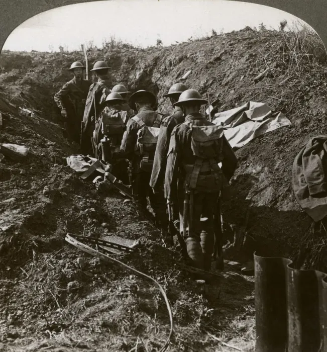 Framed Print : Officer watching his men file into a dug-out to avoid a German strafe, World War I, 1914-1918. Artist: Realistic Travels Publishers Framed Print : Officer watching his men file into a dug-out to avoid a German strafe, World War I, 1914-1918. Artist: Realistic Travels Publishers