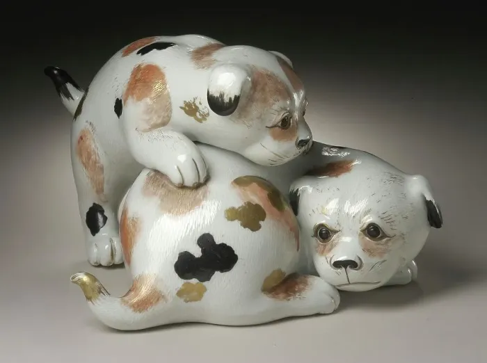 Framed Print : Okimono in the Form of a Pair of Gamboling Piebald Puppies, 19th century. Creator: Unknown Framed Print : Okimono in the Form of a Pair of Gamboling Piebald Puppies, 19th century. Creator: Unknown