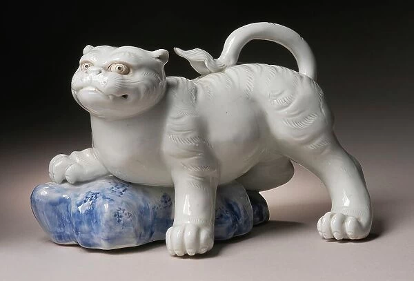 Okimono in the Form of a Tiger Climbing onto a Rock, 19th century. Creator: Unknown