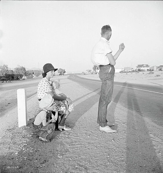 Oklahoma farm family on highway between Blythe and Indio - self-resettlement in California. 1936. Creator: Dorothea Lange