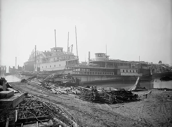 Old boats beached to rot away, New York City, between 1900 and 1910. Creator: Unknown