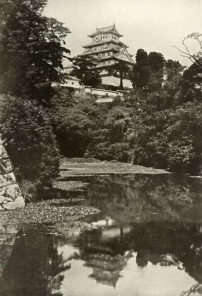 An Old Feudal Castle from the Moat, 1910. Creator: Herbert Ponting