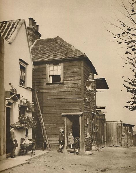 Old Houses in Highgate From Whose Doorways Villagers Watched the Coaches Pass. c1935