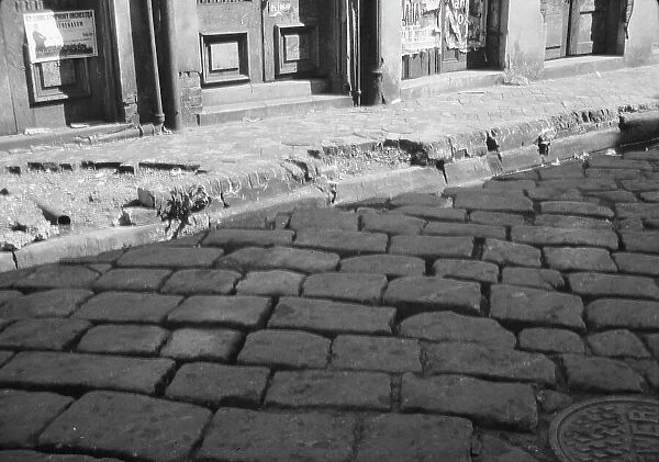 Old pavement blocks, New Orleans, between 1920 and 1926. Creator: Arnold Genthe