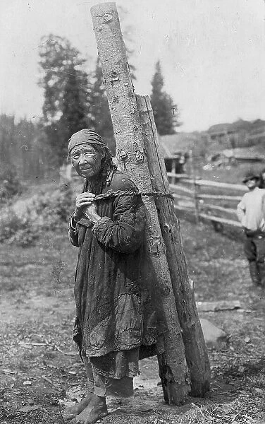 Old Shoria Woman Collecting Wood; The Kumys Ulus, 1913. Creator: GI Ivanov