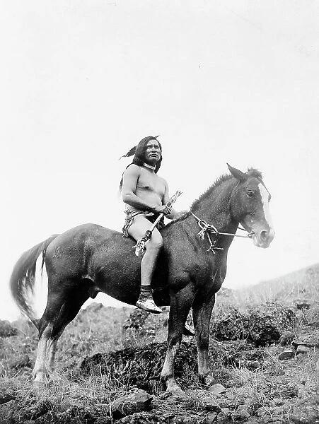 The old-time warrior-Nez Percé, c1910. Creator: Edward Sheriff Curtis
