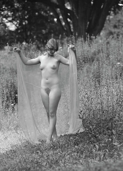 Olson, Margaret, Miss, standing outdoors, 1924 July. Creator: Arnold Genthe
