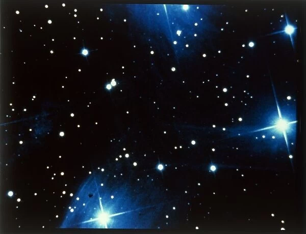 Open star cluster, the Pleiades in Taurus. Creator: NASA