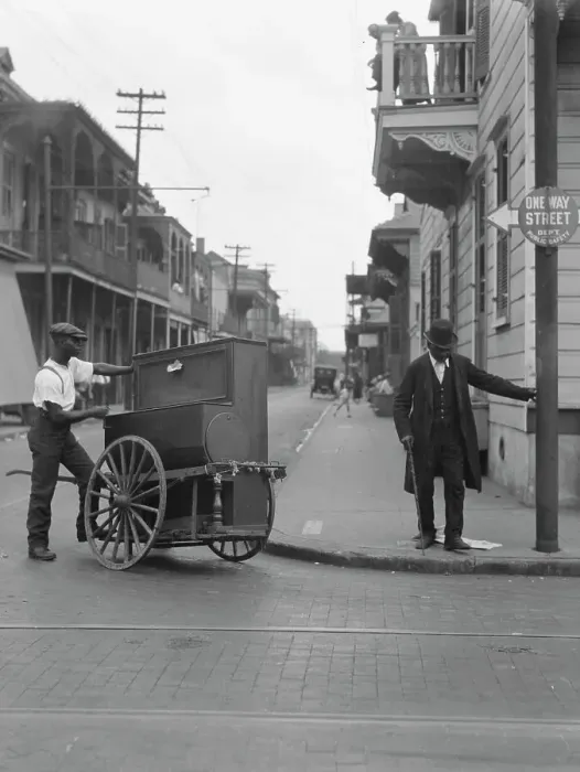 Framed Print : Organ grinder, New Orleans, between 1920 and 1926. Creator: Arnold Genthe Framed Print : Organ grinder, New Orleans, between 1920 and 1926. Creator: Arnold Genthe