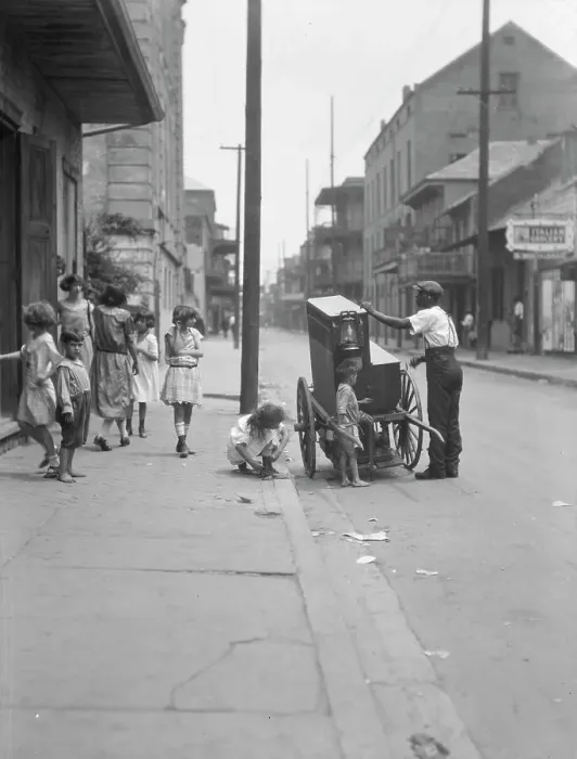 Framed Print : Organ grinder, New Orleans, between 1920 and 1926. Creator: Arnold Genthe Framed Print : Organ grinder, New Orleans, between 1920 and 1926. Creator: Arnold Genthe