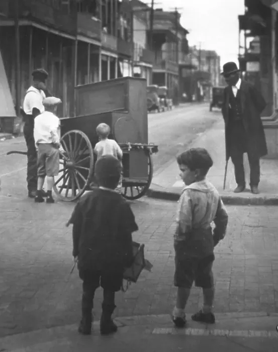 Framed Print : Organ grinder, New Orleans, between 1920 and 1926. Creator: Arnold Genthe Framed Print : Organ grinder, New Orleans, between 1920 and 1926. Creator: Arnold Genthe