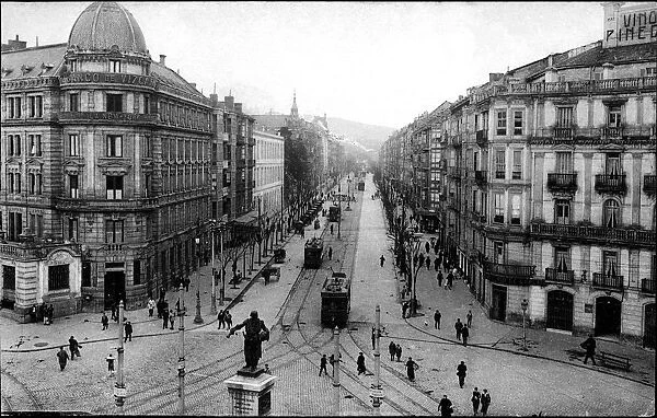 Overview of the Gran Via de Bilbao, circulating Trams, cars and pedestrians, 1910