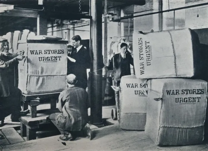 Framed Print : Packing the bales of khaki for despatch to the Government, c1914 Framed Print : Packing the bales of khaki for despatch to the Government, c1914