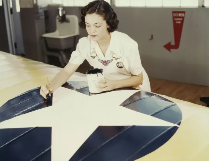 Framed Print : Painting the American insignia on airplane wings is a job that Mrs... Corpus Christi, Texas, 1942. Creator: Howard Hollem Framed Print : Painting the American insignia on airplane wings is a job that Mrs... Corpus Christi, Texas, 1942. Creator: Howard Hollem