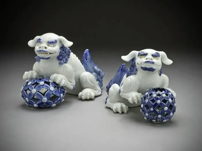 Framed Print : Pair of Okimono in the Form of Chinese Lions on Pierced Balls, 19th century. Creator: Unknown Framed Print : Pair of Okimono in the Form of Chinese Lions on Pierced Balls, 19th century. Creator: Unknown